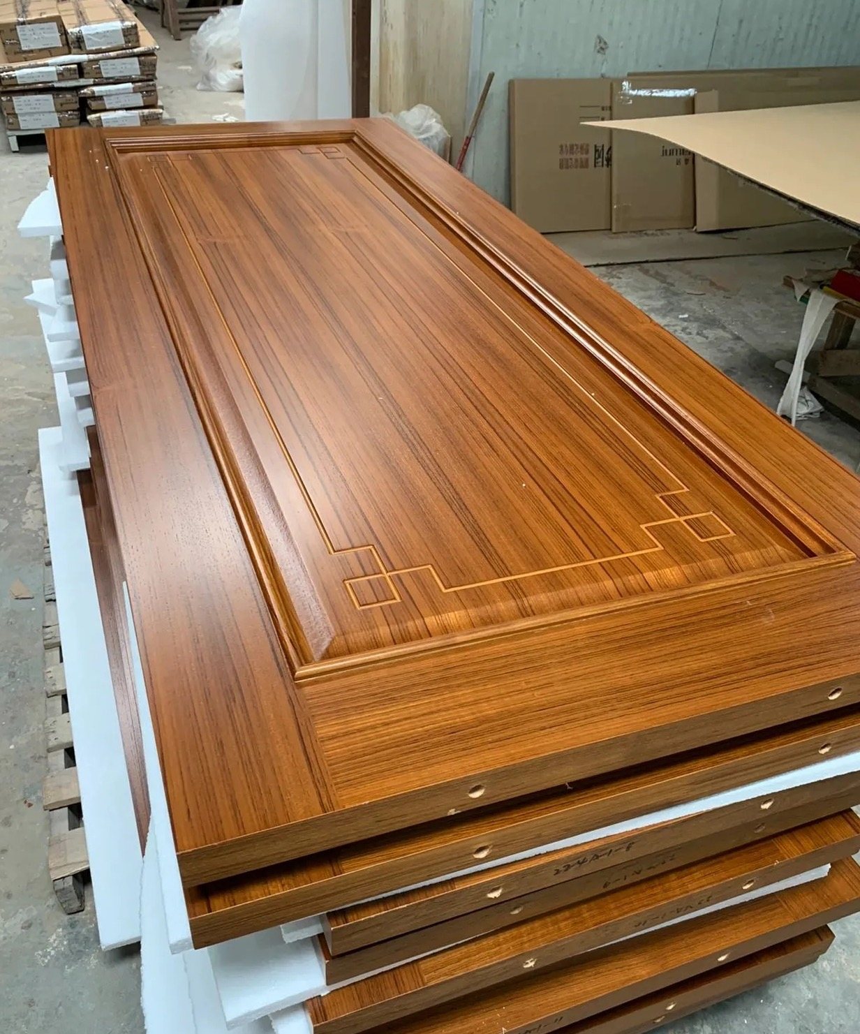 Custom solid teak entrance door ready for delivery